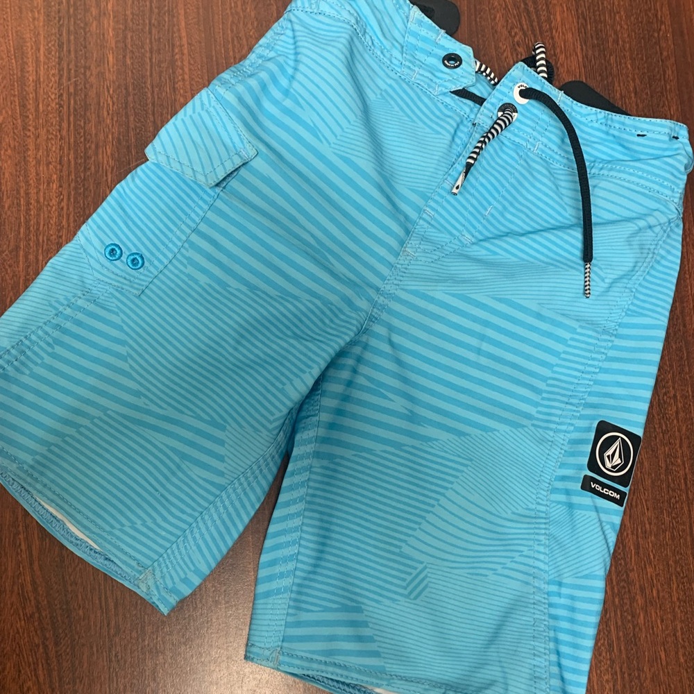 Used boys blue VOLCOM swim shorts, MOD TECH sz 6